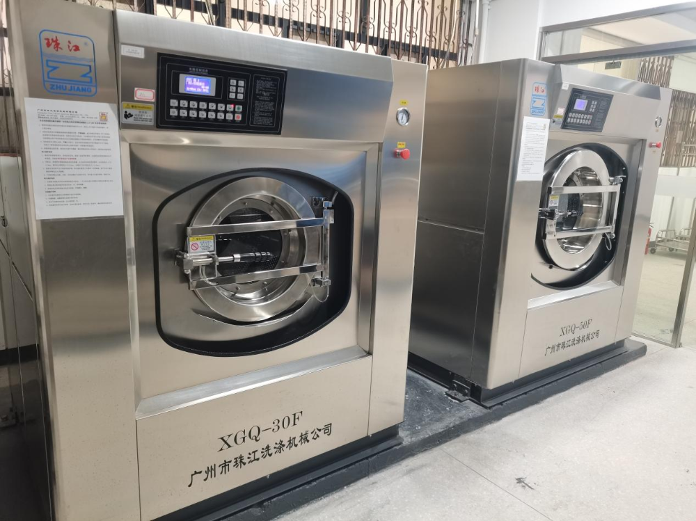 廣州大型干洗店專用工業(yè)用洗衣機(jī)XTH-250D：日均50噸布草僅耗1.5噸水，國產(chǎn)高能效廠家直營方案
